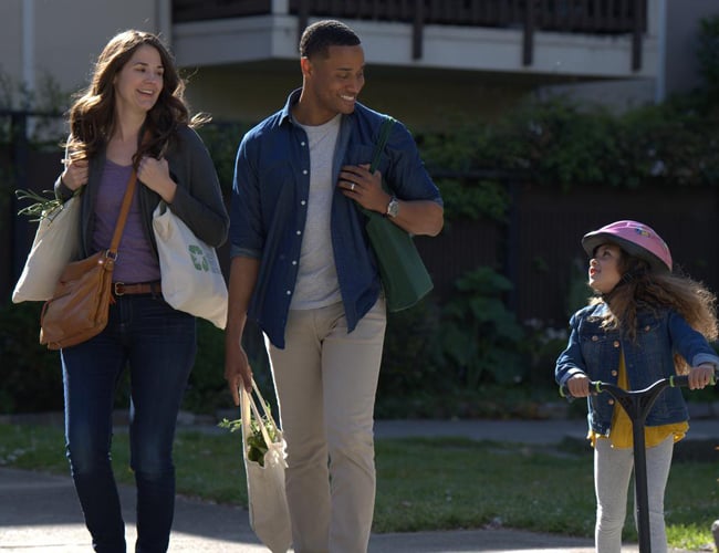 family walking together after a grocery trip